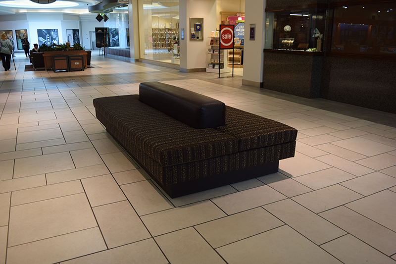 Dark bench seating in a mall